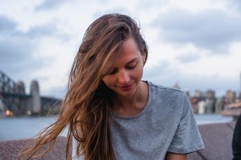 Smiling Woman Wearing Gray Crew-neck T-shirt Outdoor