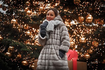 Smiling Woman Wearing Grey Faux Fur Coat