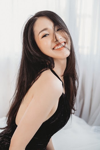 Smiling Woman Wearing Halter Dress