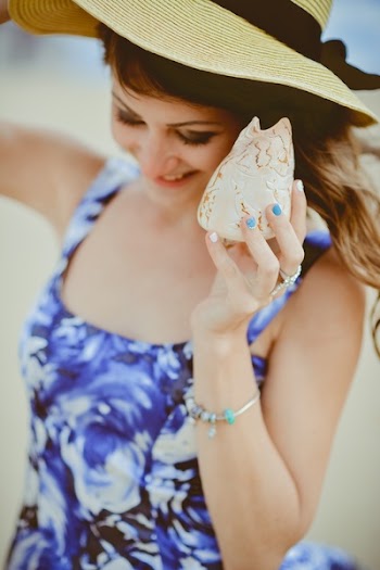 Smiling Woman Wearing Hat