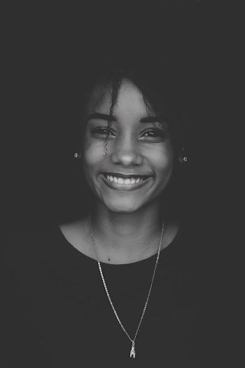 Smiling Woman Wearing Necklace