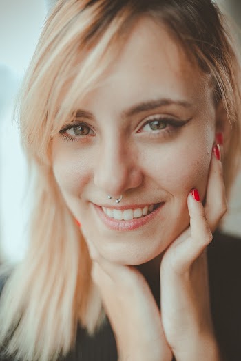 Smiling Woman Wearing Nose Piercing