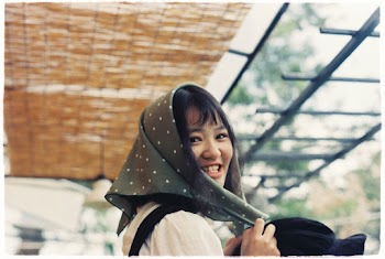 Smiling Woman Wearing Scarf