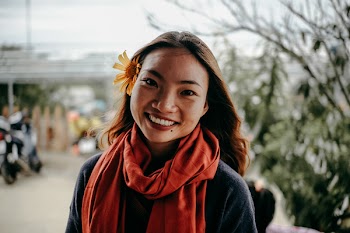 Smiling Woman Wearing Scarf 