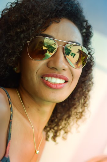 Smiling Woman Wearing Sunglasses