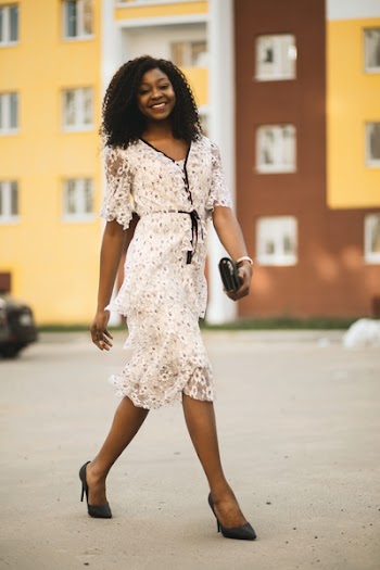 Smiling Woman Wearing White Dress