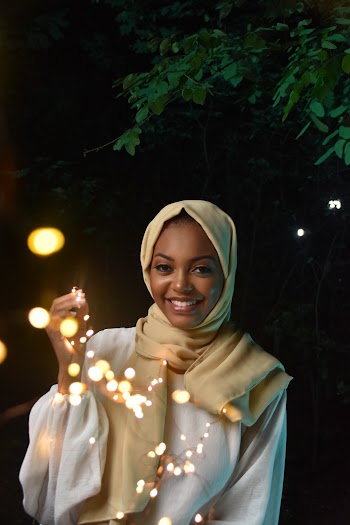 Smiling Woman Wearing Yellow Hijab 