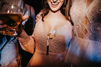 Smiling Woman White Long-sleeved Gown
