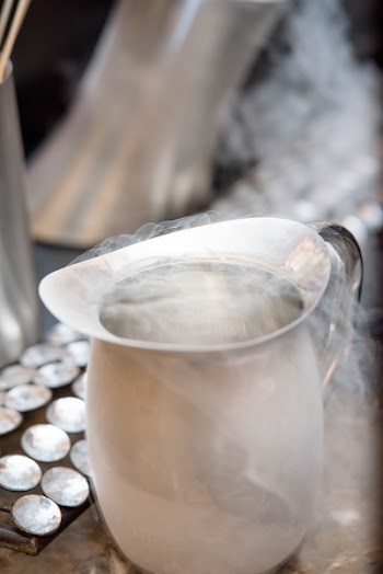 Smoke Coming Out from White Pitcher