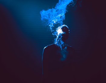 smoke coming out of person's mouth