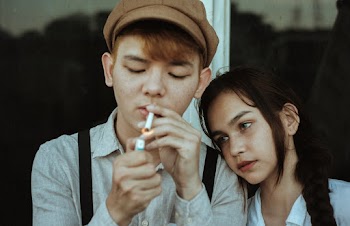 Smoking Man Wearing White Derss Shirt