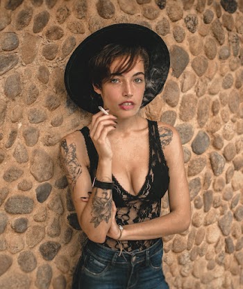 Smoking Woman Wearing Hat
