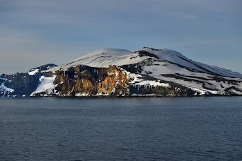 Snow-capped Mountain Beside Body of Water