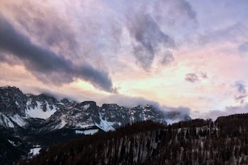 snow-capped mountain under blue and white sky