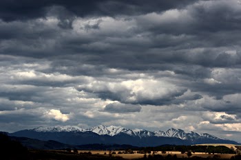 Snow-capped Mountain Under Cloudy Sky