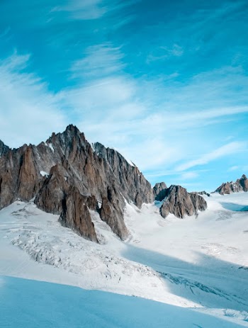 Snow Capped On Mountain Slopes
