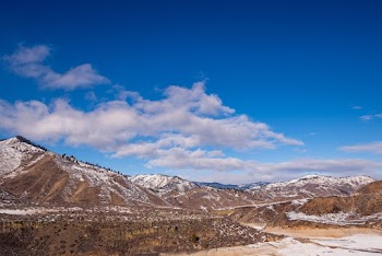 Snow Covered and Beige Mountains