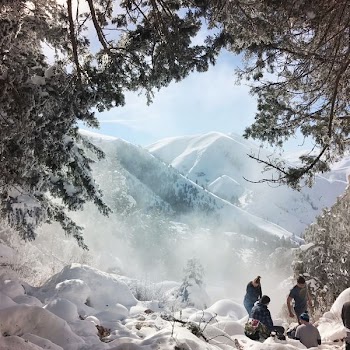 snow covered mountain during daytime