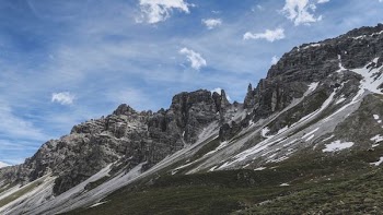 snow-covered mountain during daytime