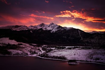 snow-covered mountain during golden hour