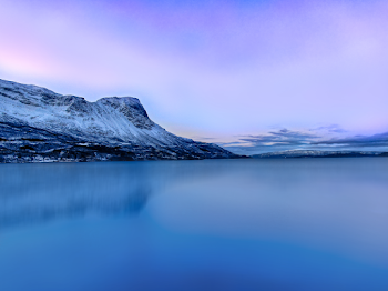 Snow Covered Mountain Near Lake