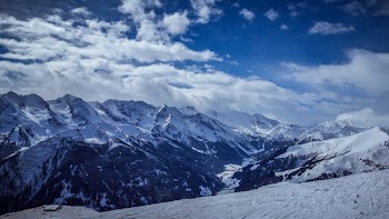 Snow-covered Mountain Under Blue Sky
