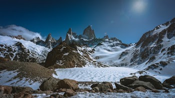 Snow Covered Mountain Under Blue Sky