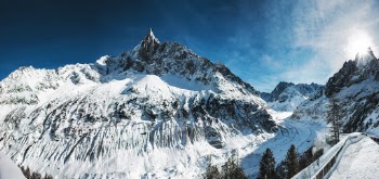 Snow Covered Mountain Under Blue Sky