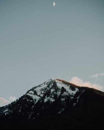 Snow Covered Mountain Under Blue Sky · Free Stock Photo
