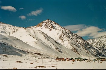 Snow in Mountains Under Blue Sky