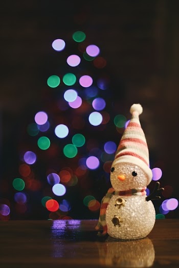 Snowman Figurine on Table