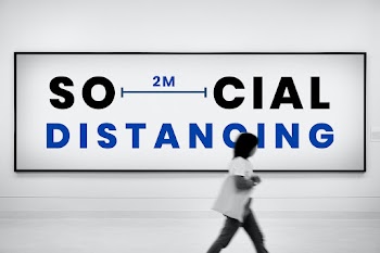 Social distancing ad on billboard