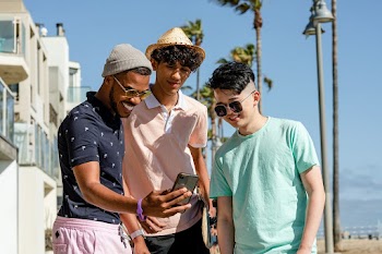Social media share, teen boys watching viral… | Free stock photo | High Resolution image