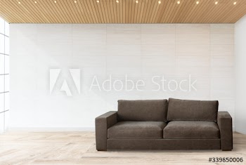 Sofa by a tiled wall