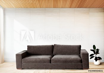 Sofa by a tiled wall