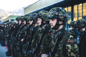 Soldiers Standing in Line Near Building