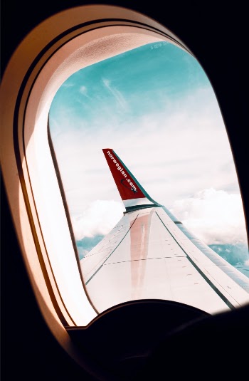 Sometimes you are lucky and get a window seat sometimes you steal it from your best friend. 