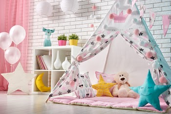 Spacious children room with play tent for girl.