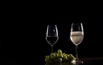 Sparkling White Wine And Grapes
