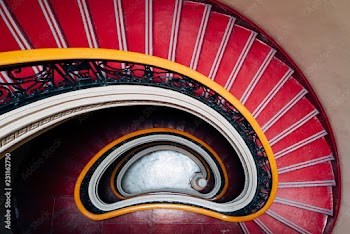 Spiral red downward staircase
