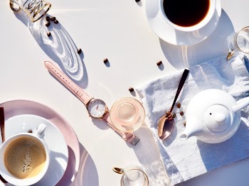 Spoon, Watch, Cups, and Kettle on Table