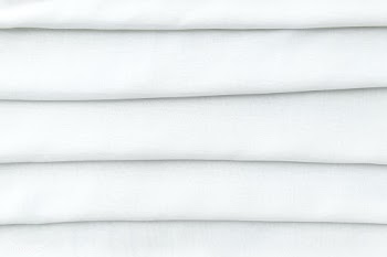 Stack of folded white woven fabric patterned background | Free  photo - 2354217