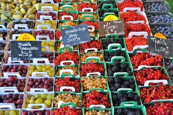 Stack of Fruits With Signage