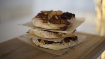 Stack of Pies on Brown Wooden Panel in Tilt Shift Lens