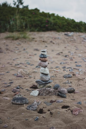Stack of Stones on the Middle of Brown Soil