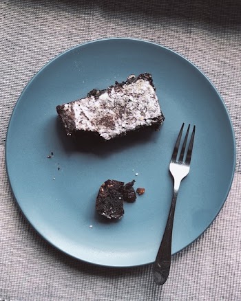 Stainless Steel Fork On Top Of Blue Ceramic Plate