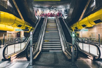 Stair in the Middle of Escalators