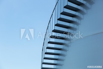 Staircase along steel storage tank