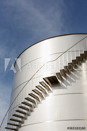 Staircase along steel storage tank