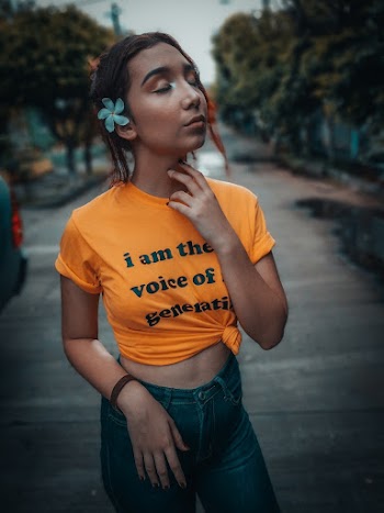 Standing Girl Wearing Orange and Black Crew-neck T-shirt